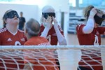 Goalball players wearing goggles